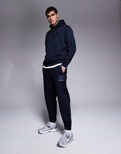 https://images.asos-media.com/products/armani-exchange-co-ord-joggers-in-navy/206822297-1-navy?$n_750w$&wid=750&fit=constrain