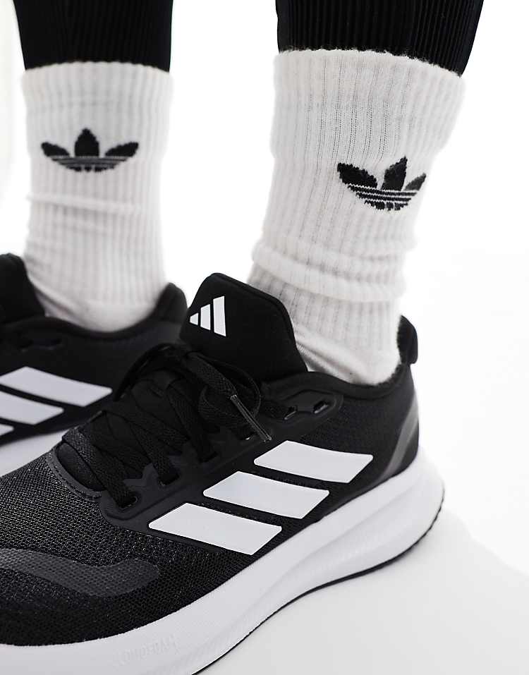 https://images.asos-media.com/products/adidas-running-runfalcon-trainers-in-black-and-white/206885323-4?$n_750w$&wid=750&fit=constrain