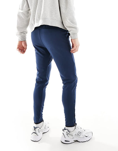 https://images.asos-media.com/products/new-balance-tenacity-knit-training-pant-in-blue/207821330-2?$n_750w$&wid=750&fit=constrain