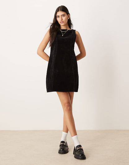 https://images.asos-media.com/products/asos-design-flocked-denim-mini-dress-in-black/208131414-1-black?$n_750w$&wid=750&fit=constrain