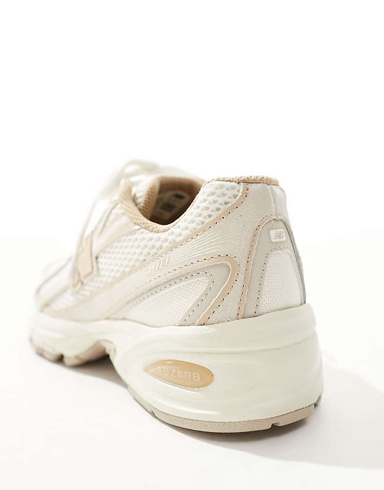 https://images.asos-media.com/products/new-balance-740-trainers-in-beige-and-tan/208142992-5?$n_750w$&wid=750&fit=constrain