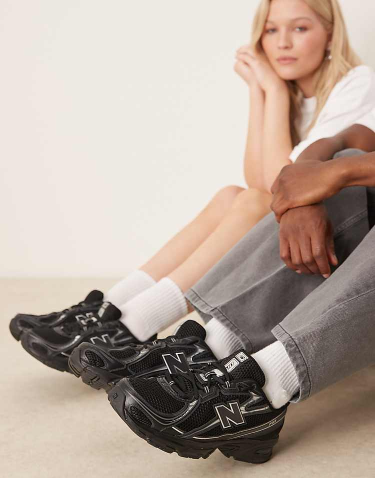 https://images.asos-media.com/products/new-balance-740-trainers-in-black-and-silver-metallic/208143014-1-black?$n_750w$&wid=750&fit=constrain