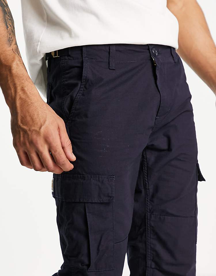 https://images.asos-media.com/products/carhartt-wip-aviation-slim-fit-cargo-trousers-in-navy/24092536-3?$n_750w$&wid=750&fit=constrain