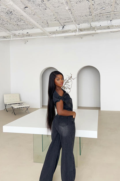 https://cdn.shopify.com/s/files/1/0293/9277/files/4-22-2024__010_Dakota_Denim_Jumpsuit_Black_GF.jpg?v=1714601385