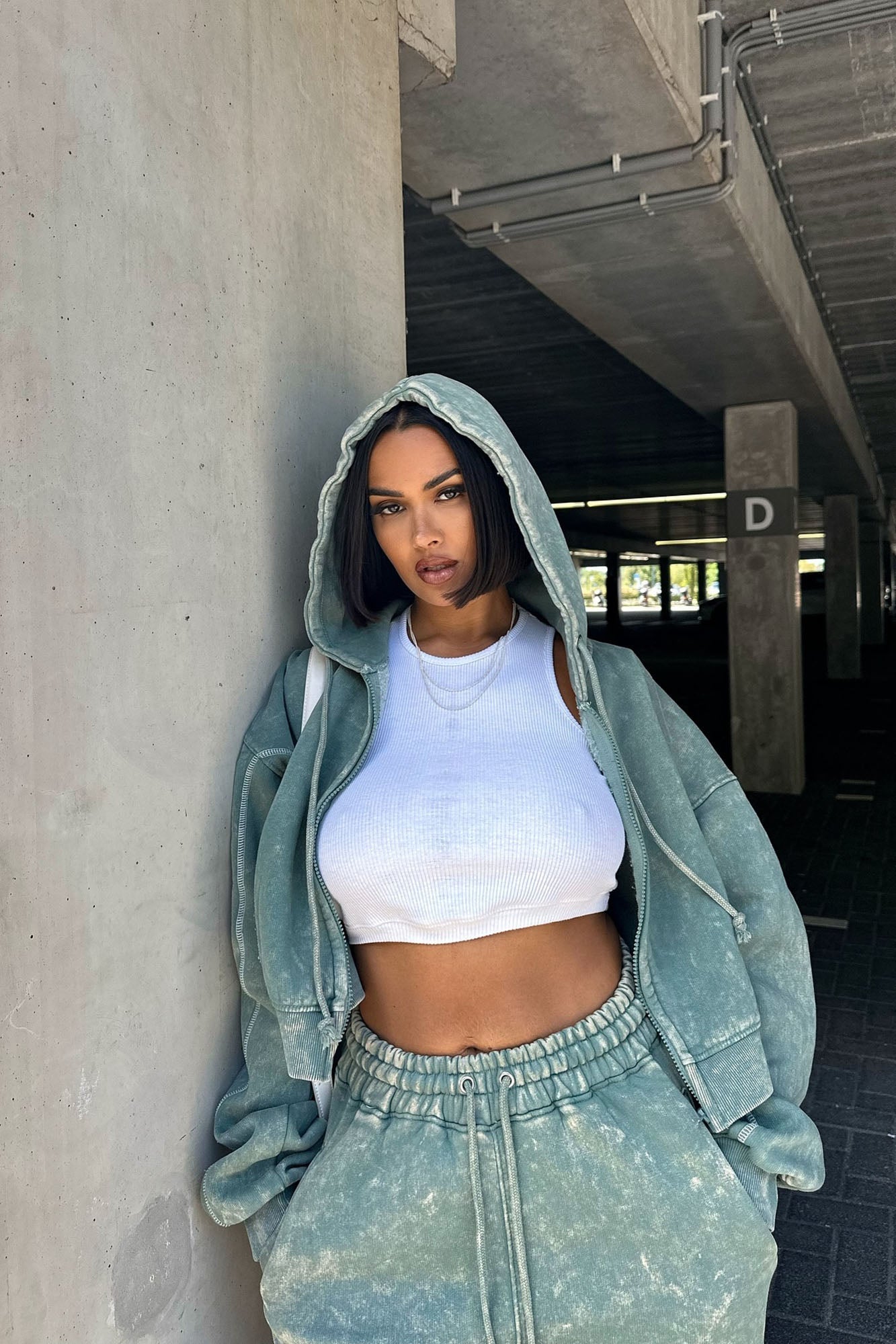 https://cdn.shopify.com/s/files/1/0293/9277/files/7-8-2024__192_Norah_Washed_Lounge_Hoodie_Sage_LA.jpg?v=1721755783