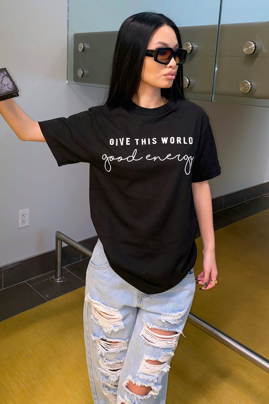 https://cdn.shopify.com/s/files/1/0293/9277/files/GiveThisWorldGoodEnergyShortSleeveTop-Black_MER_ae0b291b-904b-4647-91c4-66aa842e90ee.jpg?v=1688061344