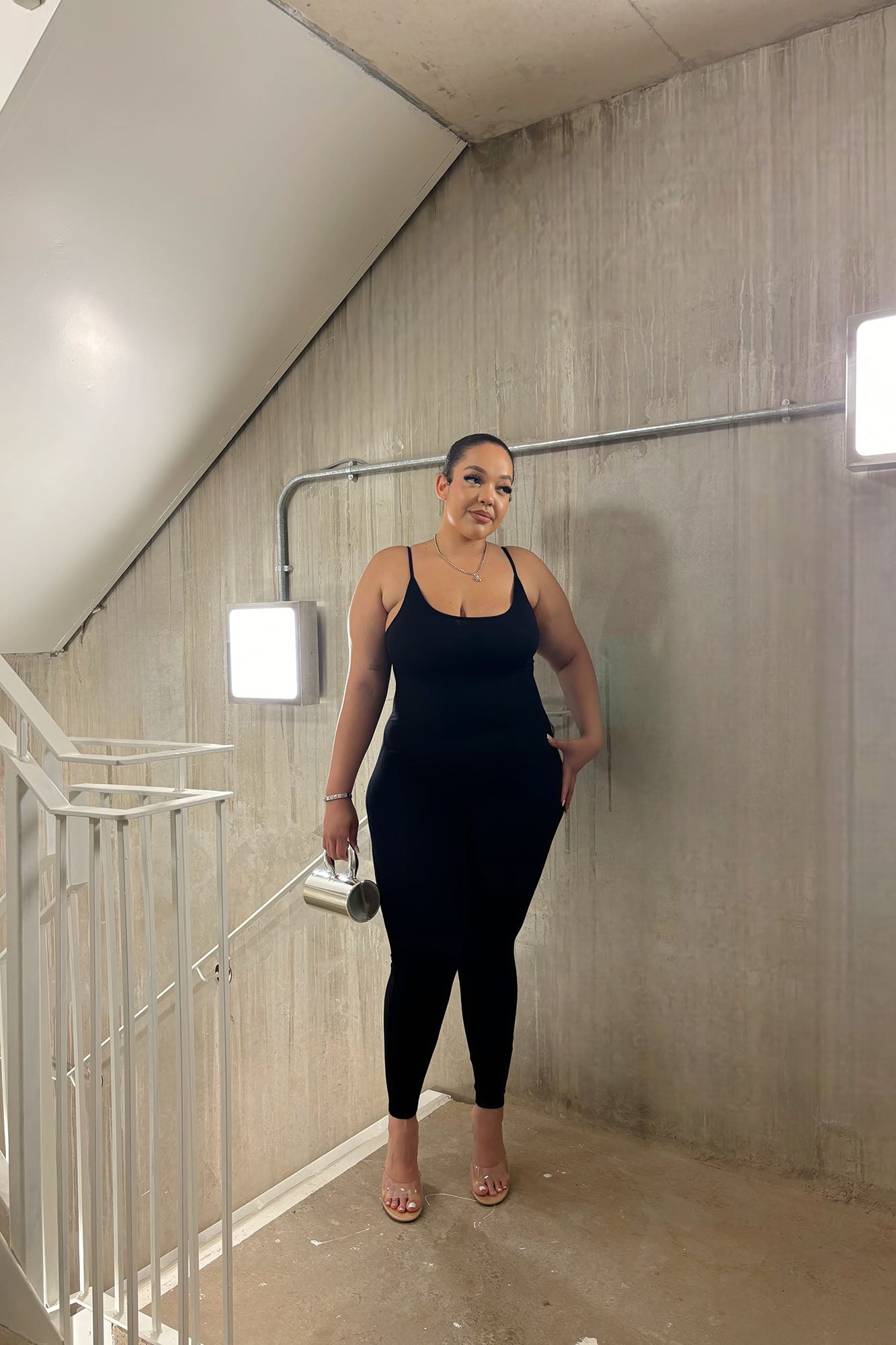 https://cdn.shopify.com/s/files/1/0293/9277/files/NovaSeasonJumpsuit-Black_GF.jpg?v=1717607831