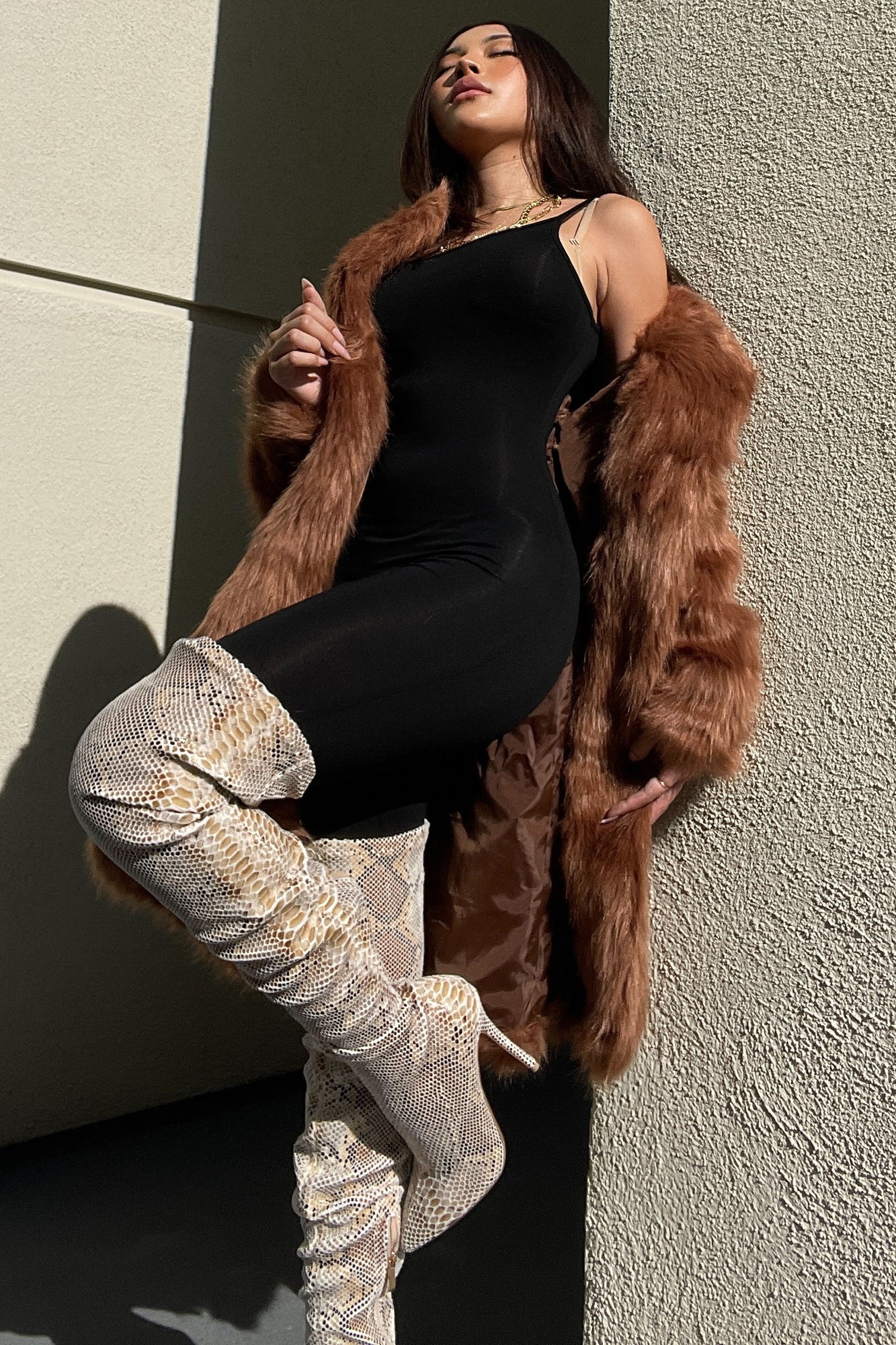 https://cdn.shopify.com/s/files/1/0293/9277/products/NovaSeasonJumpsuit-Black_MER_4ee3a8ac-5019-42bc-bcde-baebdaad46b8.jpg?v=1691624022