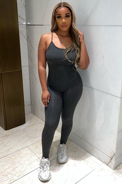 https://cdn.shopify.com/s/files/1/0293/9277/products/NovaSeasonJumpsuit-Charcoal_MER.jpg?v=1699920577