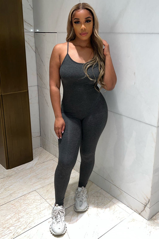 https://cdn.shopify.com/s/files/1/0293/9277/products/NovaSeasonJumpsuit-Charcoal_MER.jpg?v=1699920577
