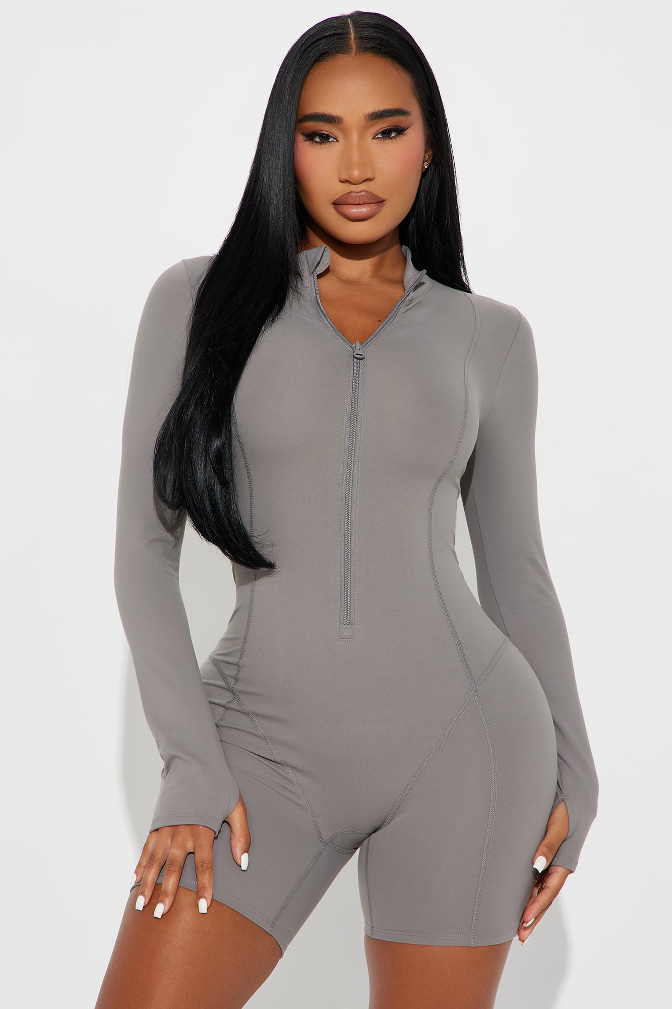 Fashion Nova Active Romper for women in gray with long sleeves and zip front design