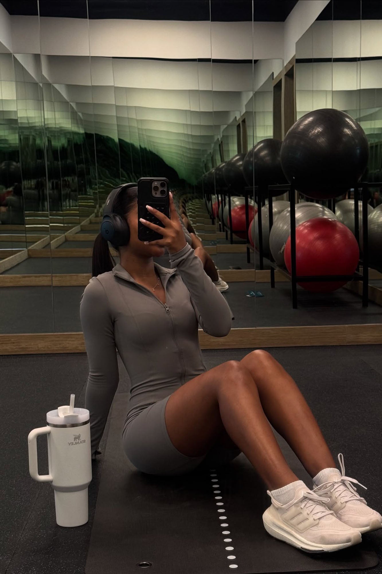 Fashion Nova active romper for women in grey, perfect for workouts at the gym with sleek design