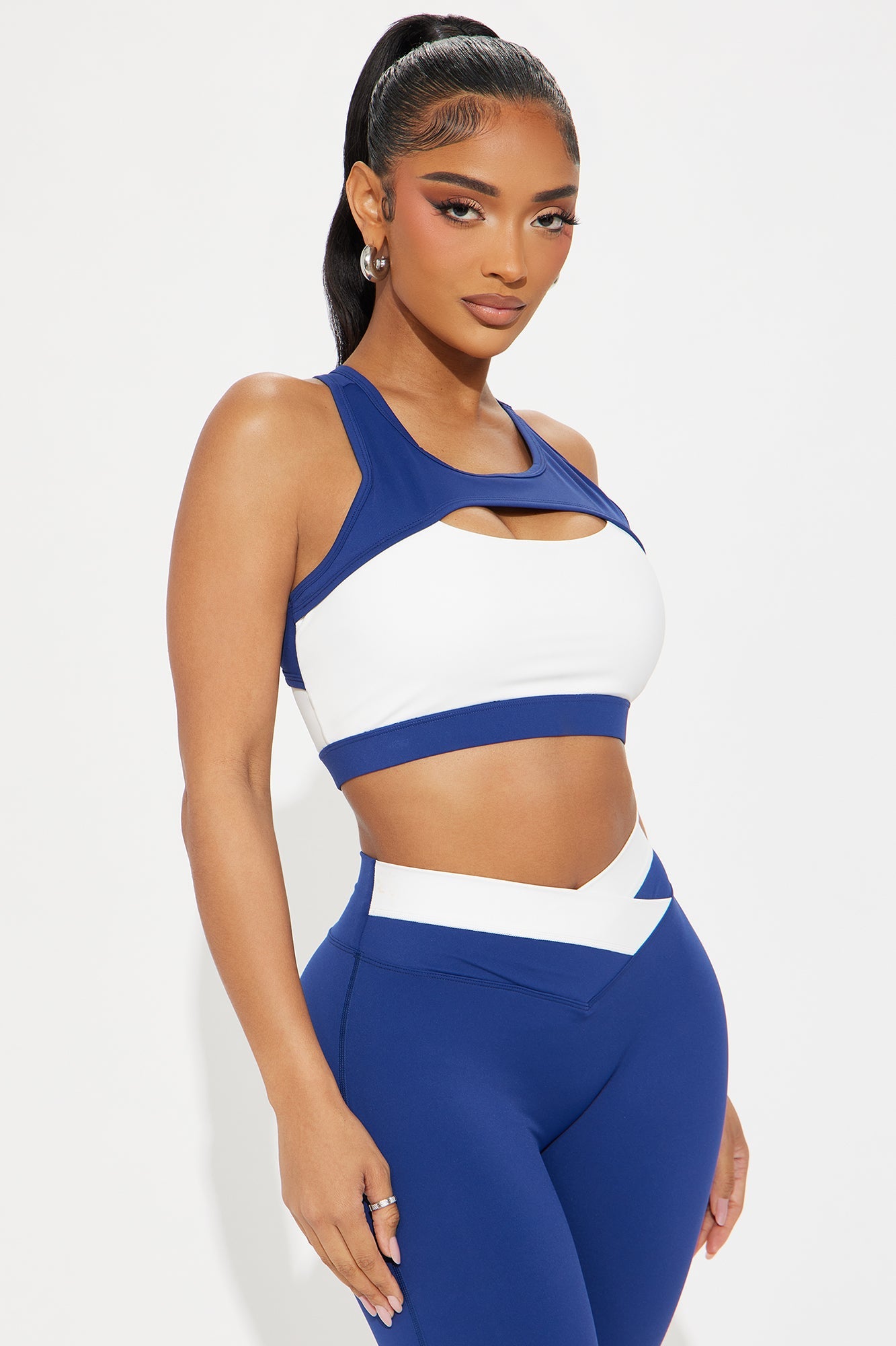 Midnight blue activewear set featuring a stylish crop top and leggings for active outfits