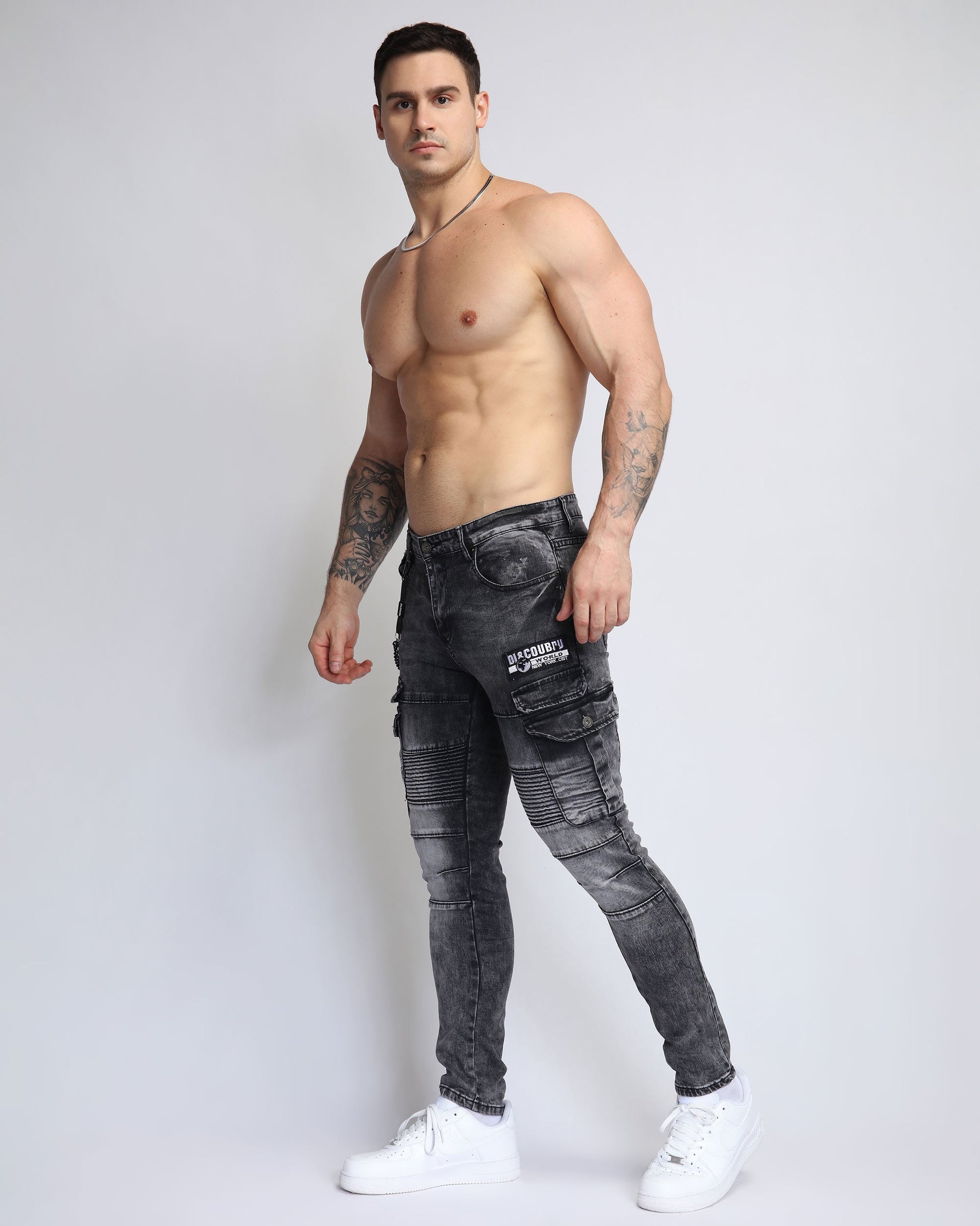 Logeqi badge design workwear jeans in black with cargo pockets and a slim fit for modern style