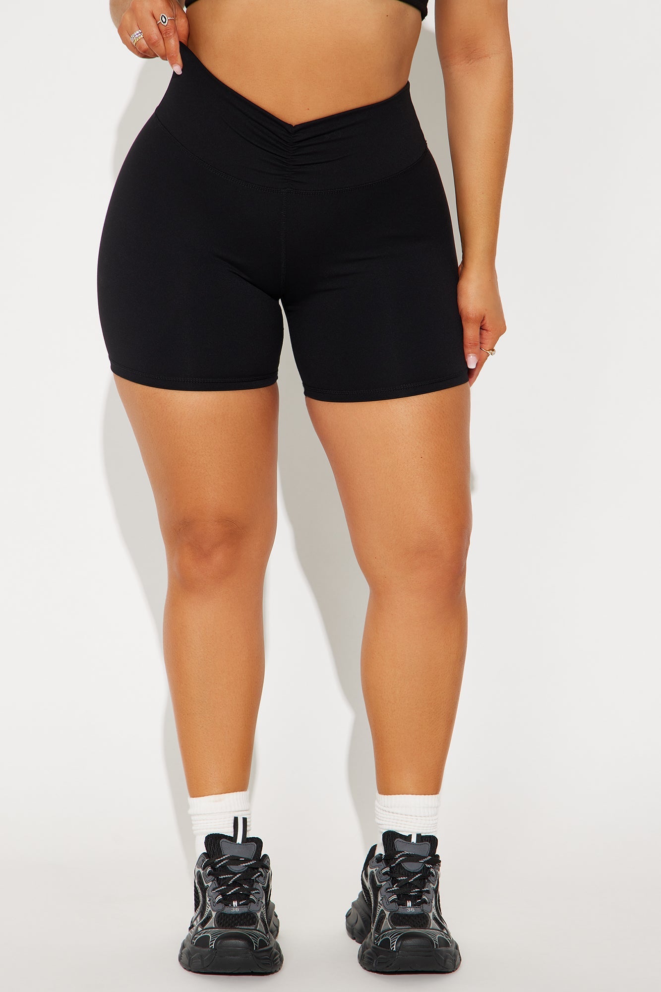 Black active shorts for women with high waist and fitted design for workouts and casual wear