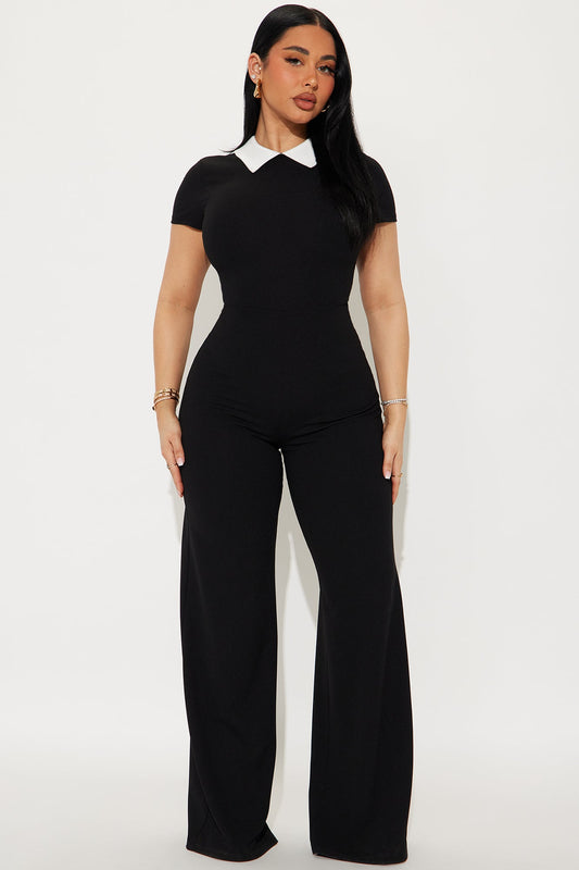 Fashion Nova black and white short sleeve jumpsuit featuring a stylish collar and fitted design