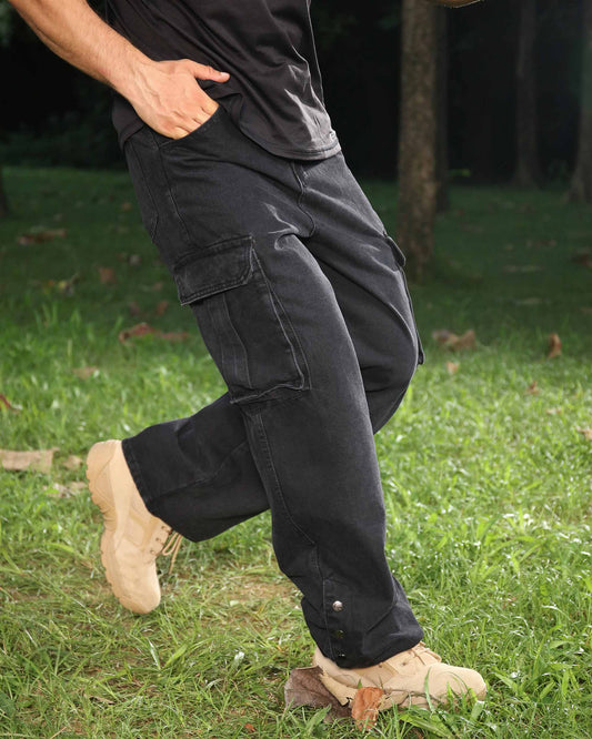 Logeqi black baggy jeans for men styled outdoors with cargo pockets and relaxed fit
