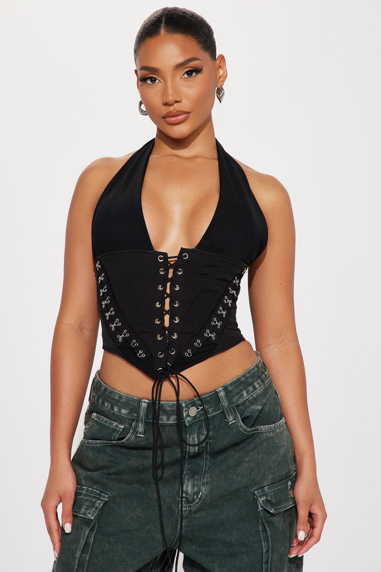 Stylish black lace up halter top with a plunging neckline and adjustable tie for a trendy fit