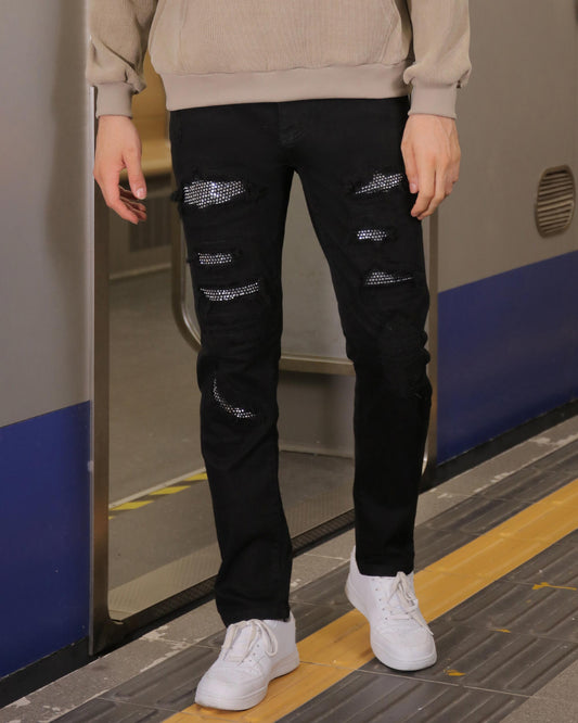 Logeqi black ripped jeans for men featuring distressed detailing and a slim fit style