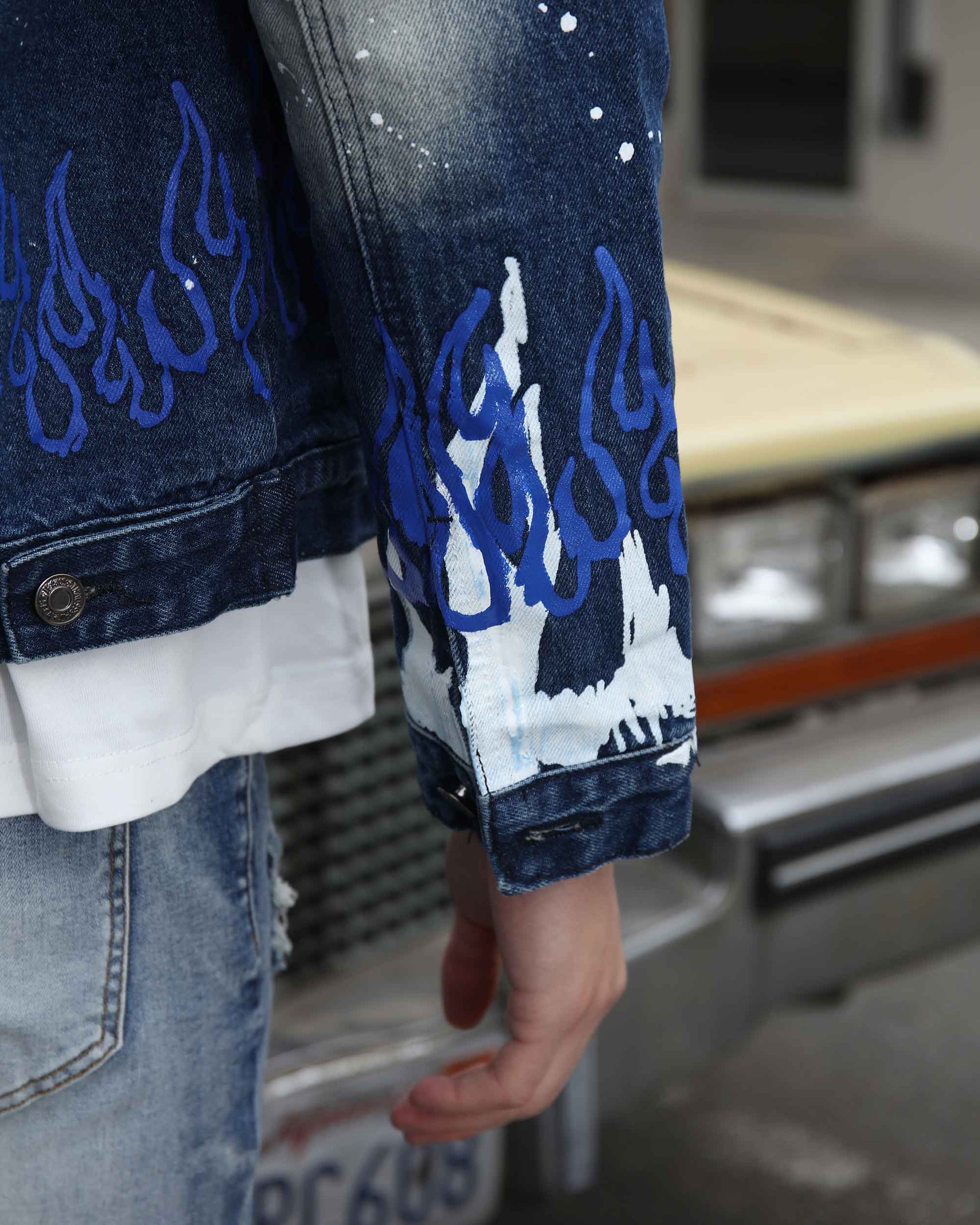 Logeqi blue denim graffiti jacket with flame designs on the sleeves for a trendy look