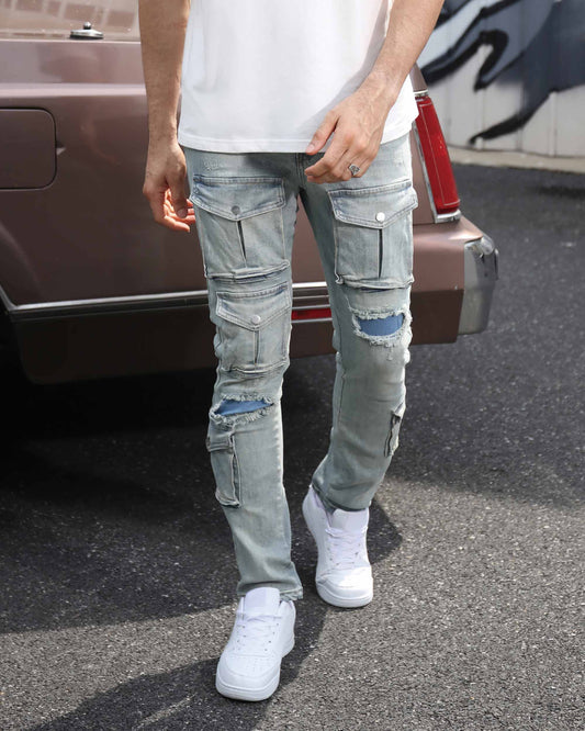 Logeqi blue ripped jeans with pockets worn by a person standing next to a car outdoors