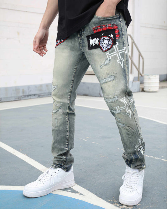 Logeqi blue ripped jeans with skull print featuring stylish patches and distressed details