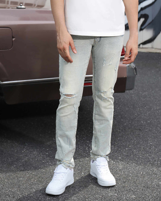 Logeqi straight fit ripped jeans with distressed detailing and a light wash for a casual style