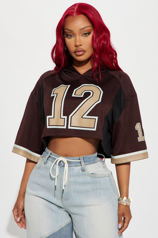 Fashion Nova brown hooded cropped jersey with oversized fit and number 12 design for trendy casual wear