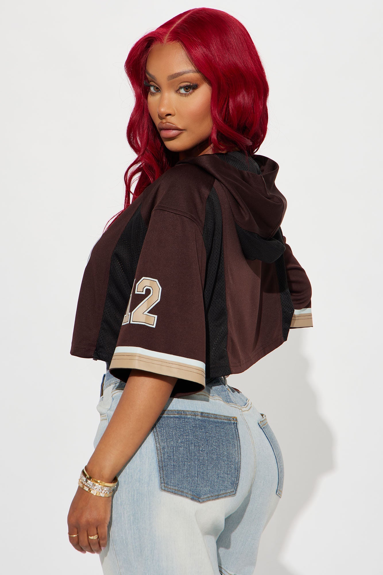 Fashion Nova brown hooded cropped jersey with stylish design and short sleeves