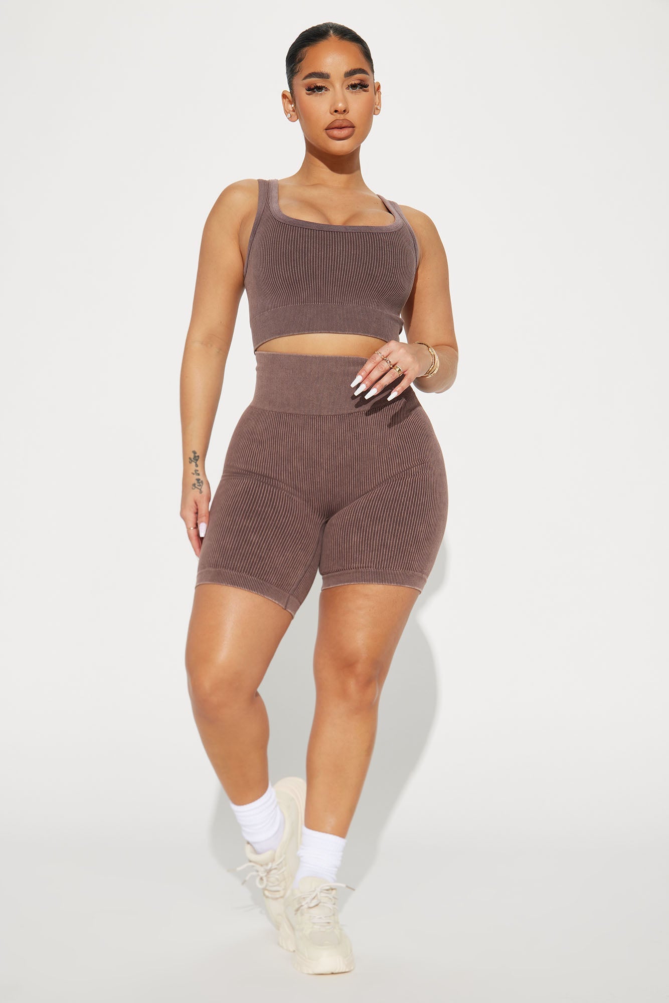 Brown lounge short set for women featuring a fitted crop top and matching bike shorts for casual comfort