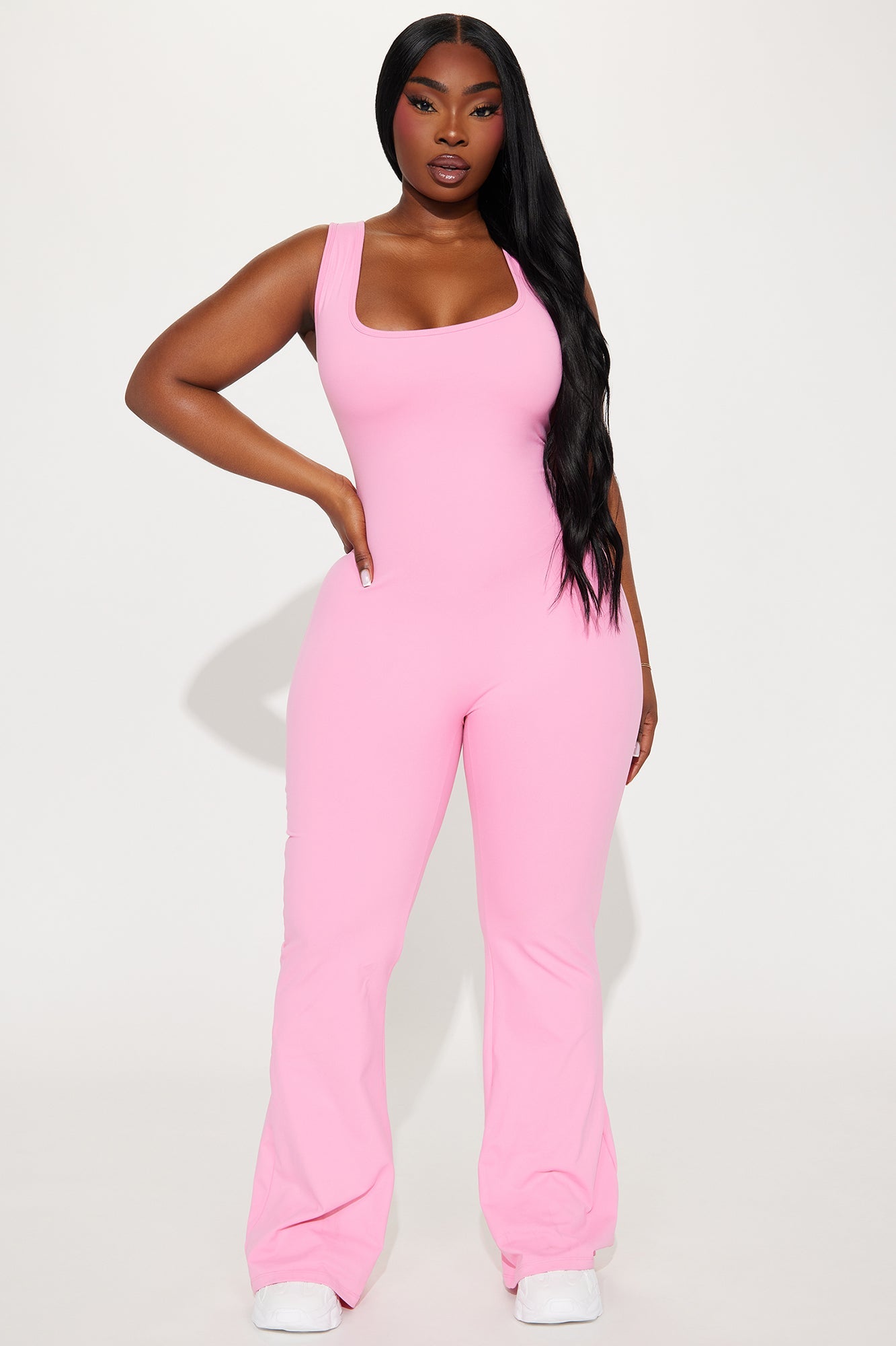 Fashion Nova bubblegum pink active jumpsuit with a fitted design for stylish workouts