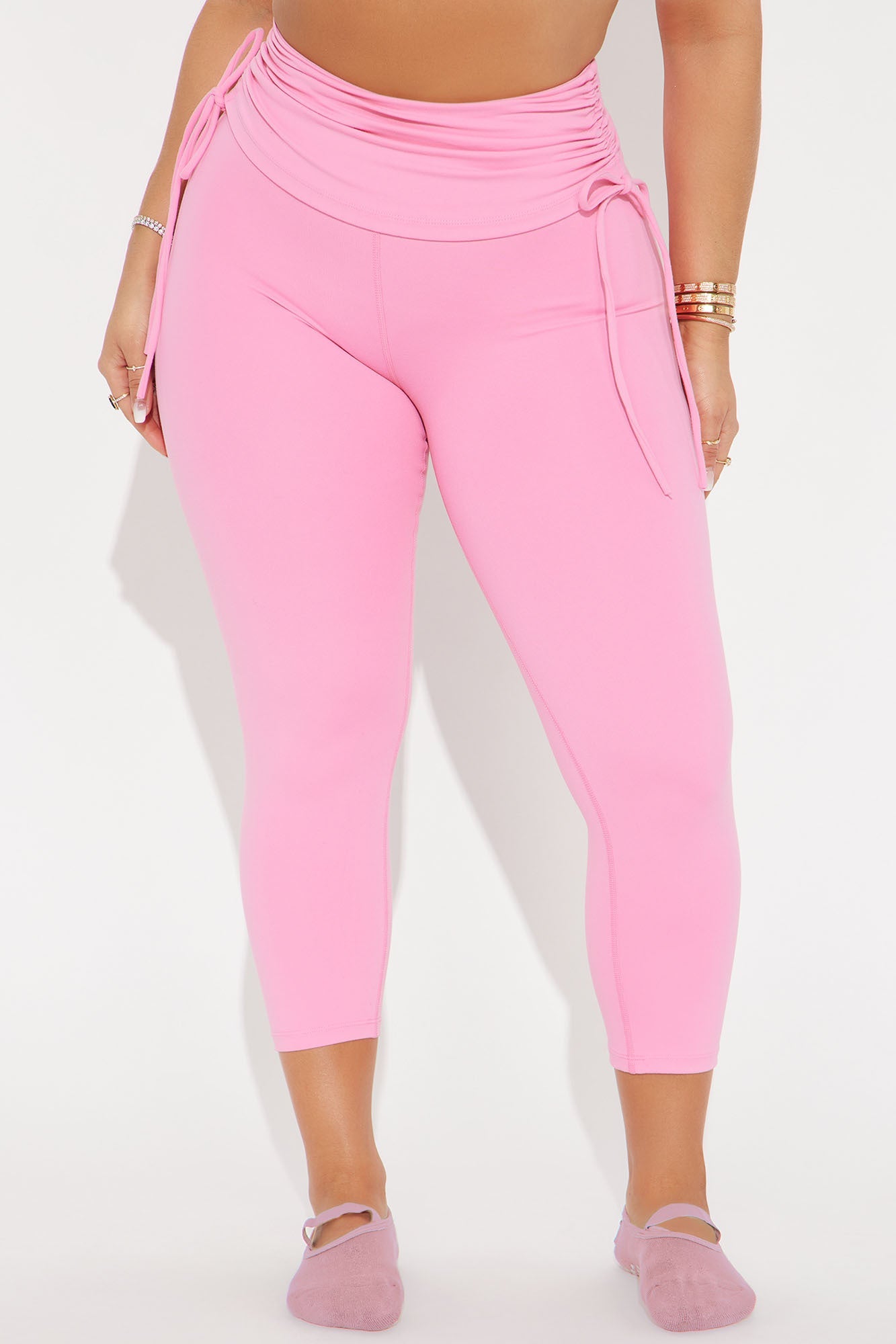 Fashion Nova bubblegum pink capri leggings with side ties for a stylish look