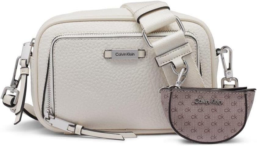 Calvin Klein camera crossbody bag in white with adjustable strap and mini wallet included