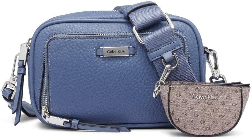 Calvin Klein camera crossbody bag in blue with detachable pouch and adjustable strap for stylish everyday use