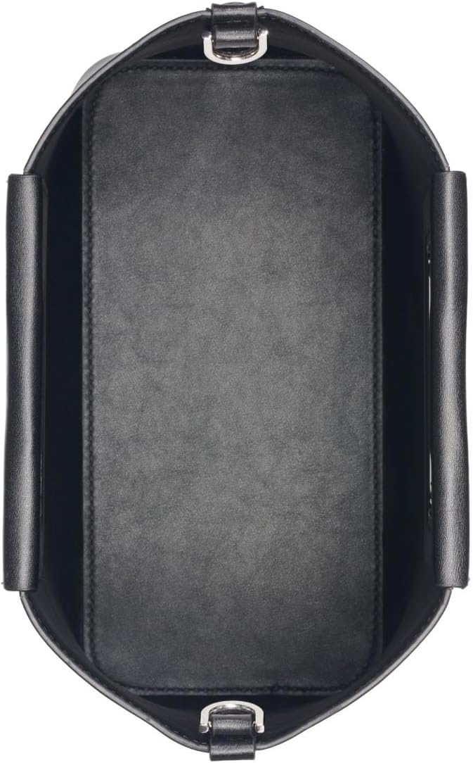 Inside view of a Calvin Klein crossbody bag showing spacious black interior