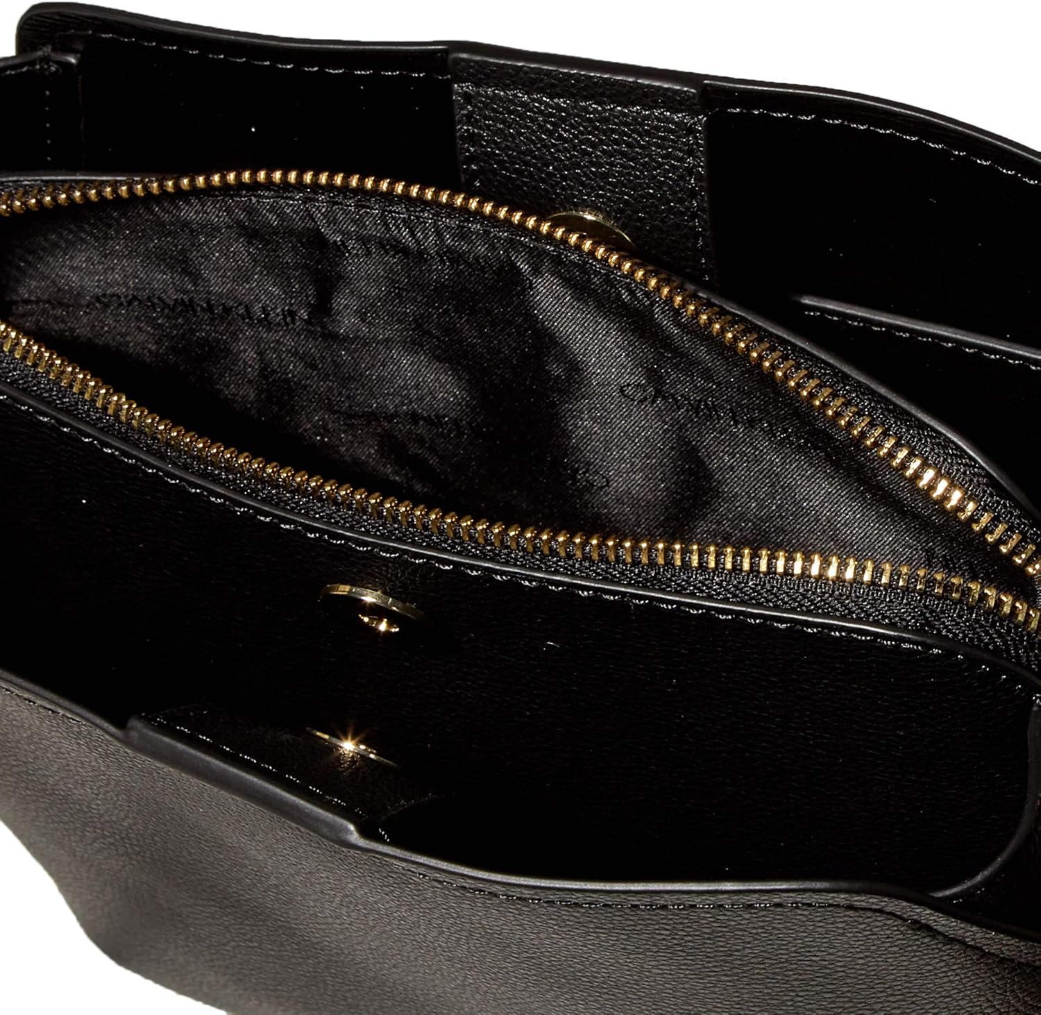 Interior view of a Calvin Klein crossbody bag for women showcasing spacious compartments and zip closure
