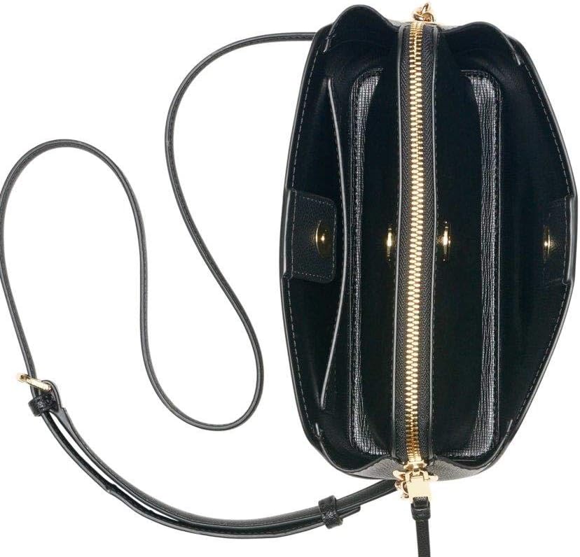 Interior view of a Calvin Klein crossbody bag for women featuring multiple compartments and a zipper closure