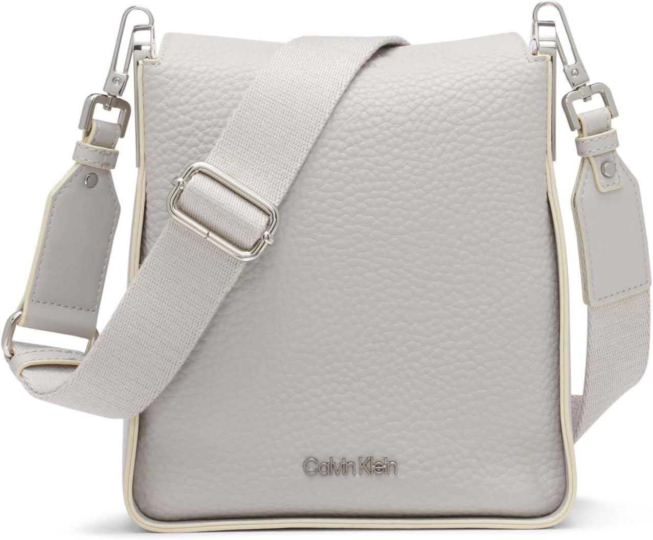 Calvin Klein crossbody bag for women in light gray leather with adjustable strap and signature logo