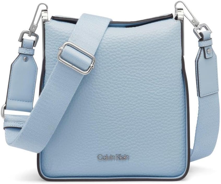 Light blue Calvin Klein crossbody bag for women with adjustable strap and textured finish