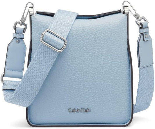 Light blue Calvin Klein crossbody bag for women with adjustable strap and textured finish