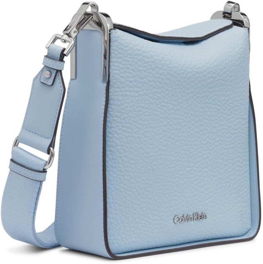 Calvin Klein crossbody bag for women in light blue with sleek design and adjustable strap