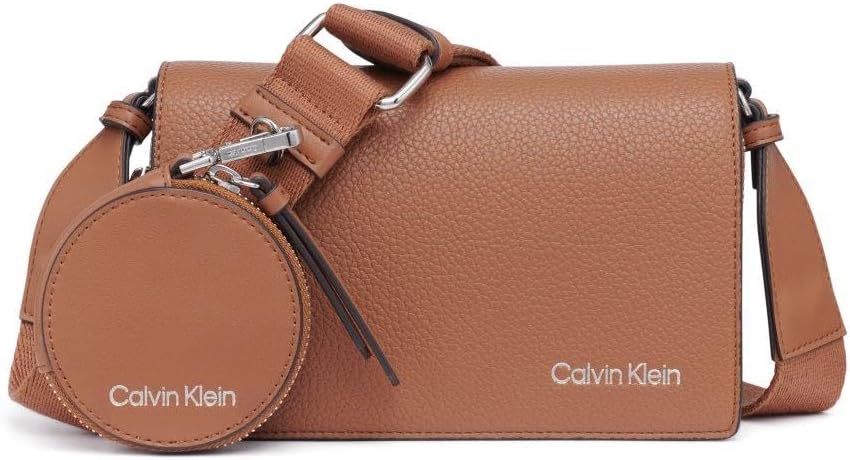 Calvin Klein Millie crossbody bag in brown leather with a removable coin pouch and adjustable strap