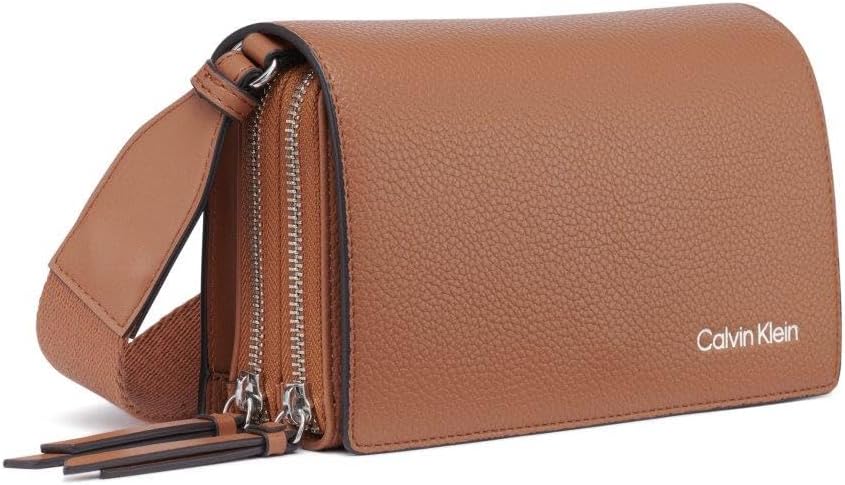 Calvin Klein Millie crossbody bag in brown with dual zip compartments and an adjustable strap