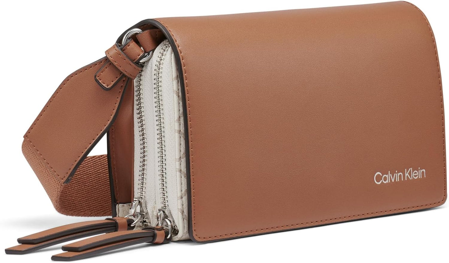 Calvin Klein Millie crossbody bag in brown with sleek design and convenient zip compartments