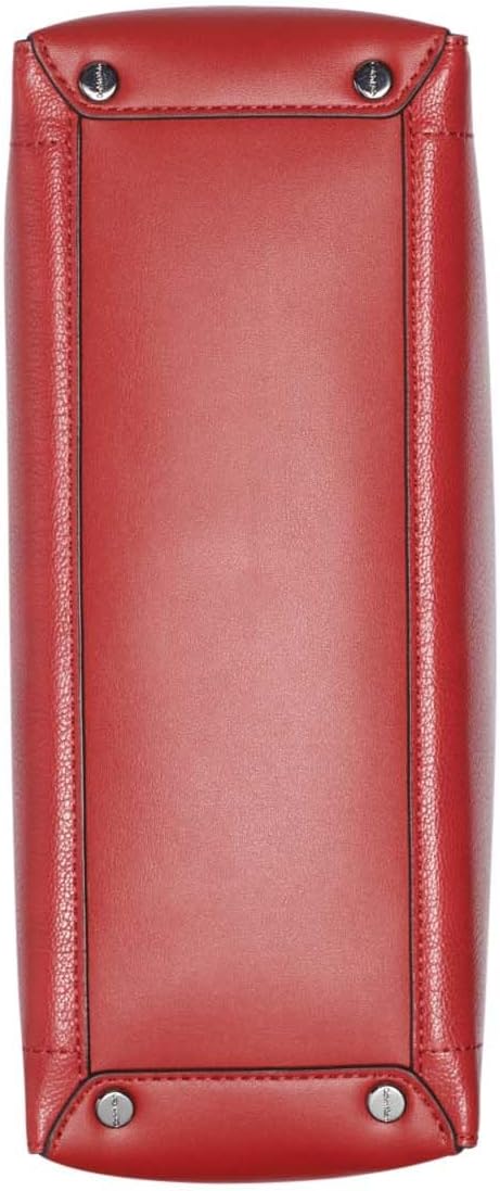 Bottom view of a Calvin Klein brown chain shoulder bag showcasing its sleek finish and sturdy construction