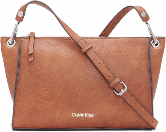 Calvin Klein Reyna crossbody bag in tan leather with adjustable strap and silver accents