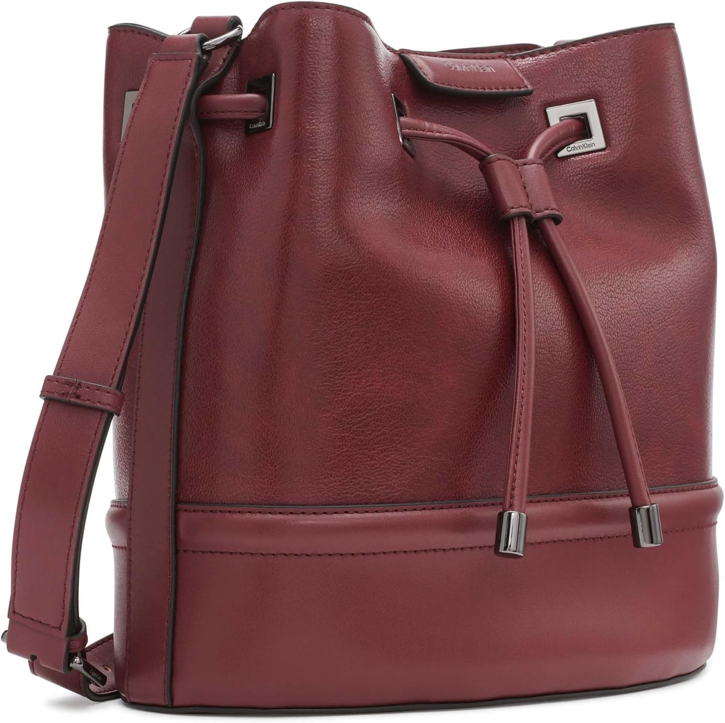 Calvin Klein silver bucket bag in burgundy with adjustable strap and drawstring closure