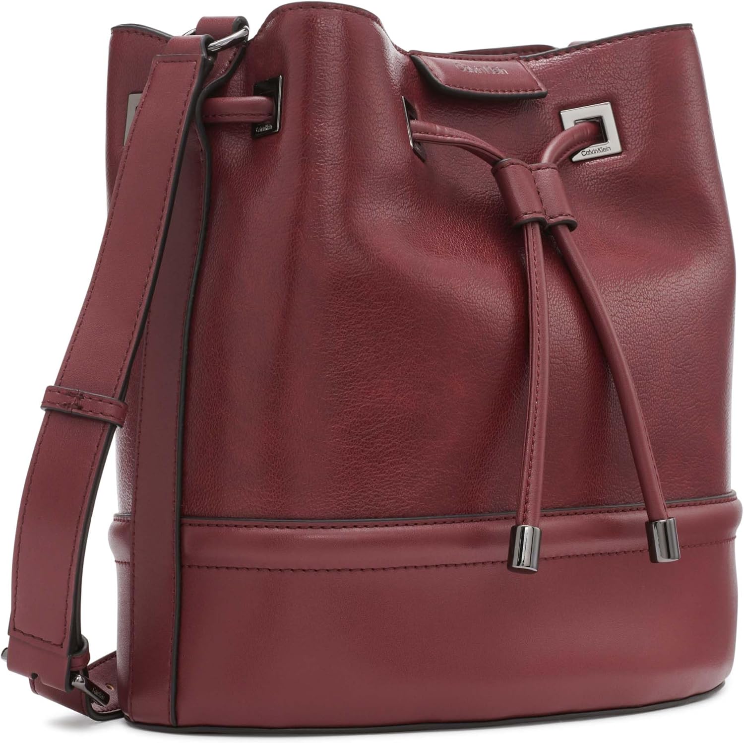 Calvin Klein silver bucket bag in burgundy with adjustable strap and drawstring closure