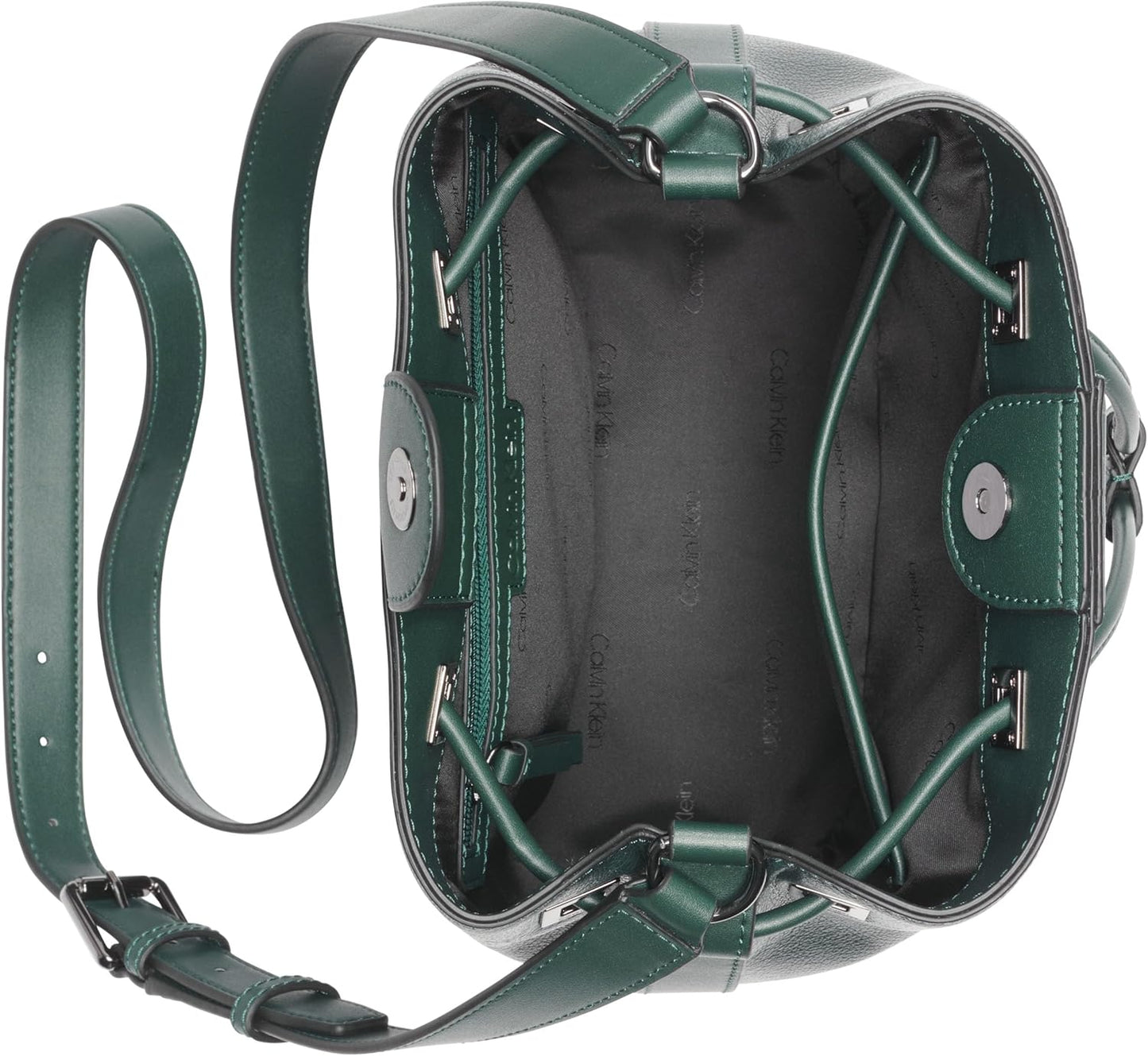Inside view of a Calvin Klein silver bucket bag with adjustable crossbody strap and spacious interior