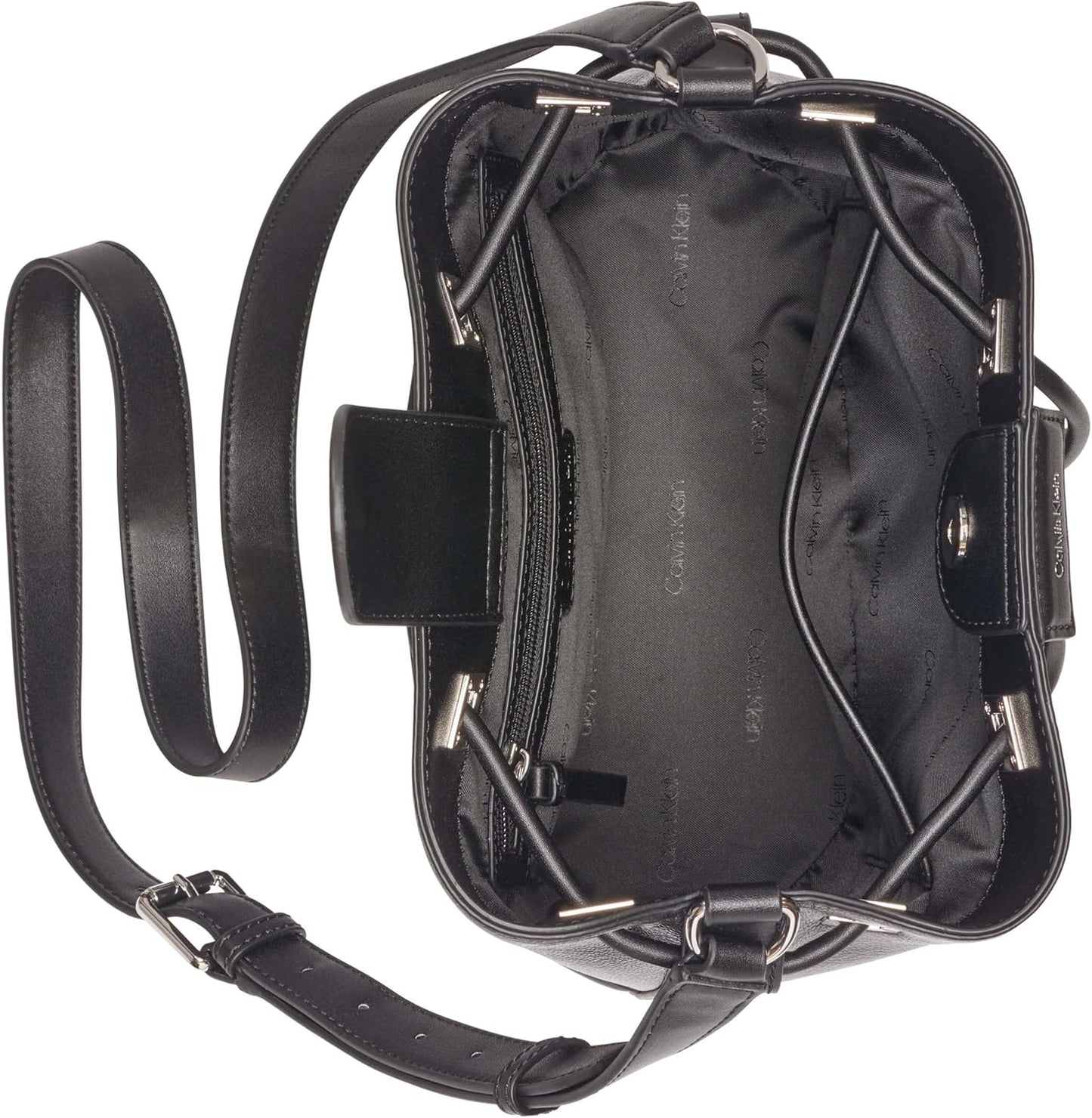 Inside view of a Calvin Klein silver bucket bag showing the spacious and organized interior design